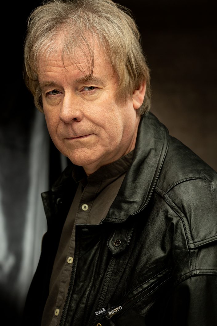 Dramatic headshot of Actor and Musician, Andy Whitaker, who plays PC Swirling on the popular ITV primetime soap, Emmerdale.